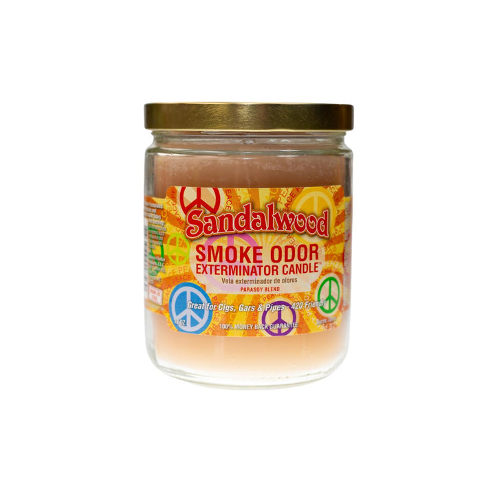 "Close-up of the Sandalwood Smoke Odor Exterminator Candle. The jar features a simple, stylish label with earthy, minimalist design elements. The candle inside has a rich, warm tan-colored wax, and the label emphasizes its classic sandalwood fragrance, ideal for neutralizing smoke and other odors." - Up N Smoke.