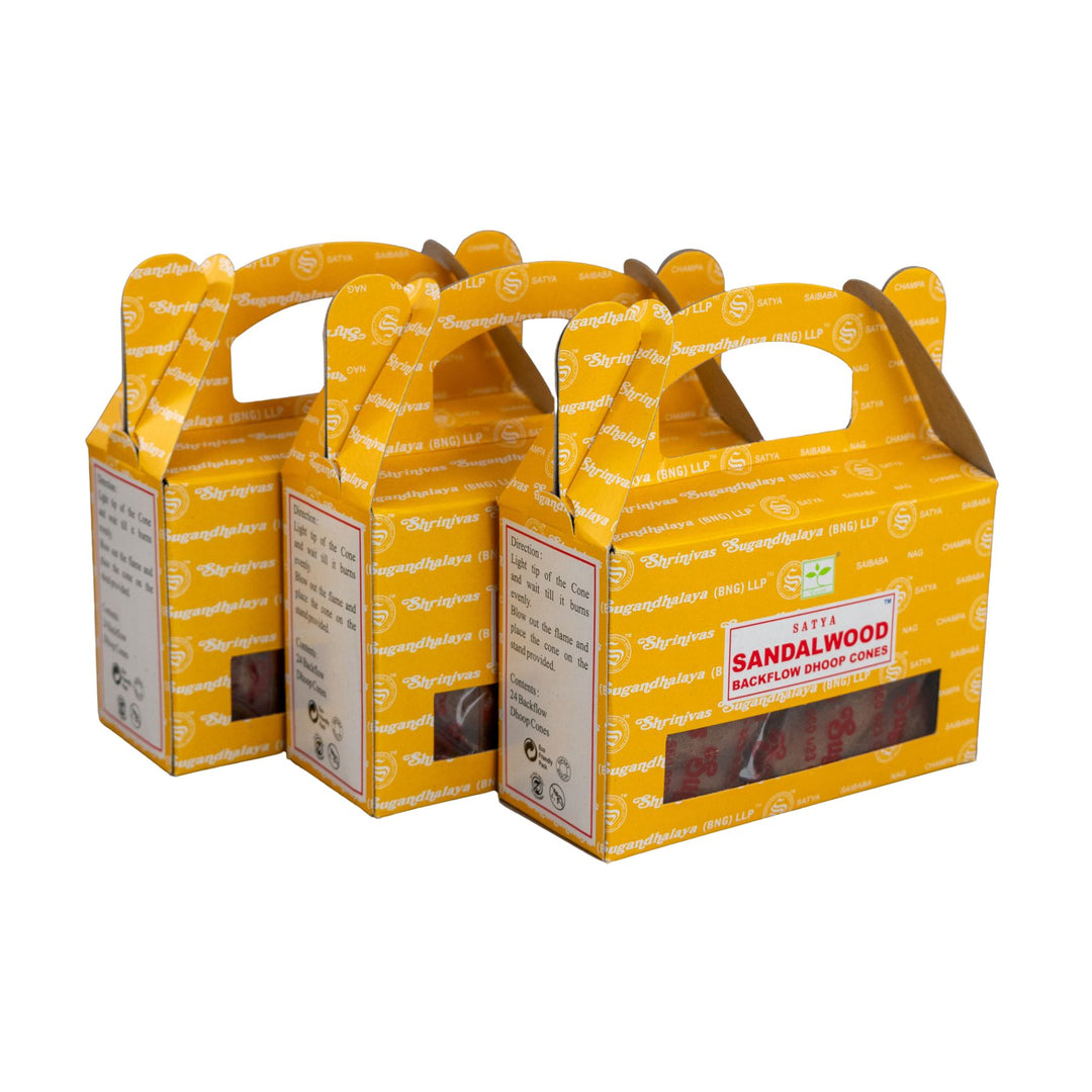 Three yellow boxes of sandalwood incense packaging on a white background