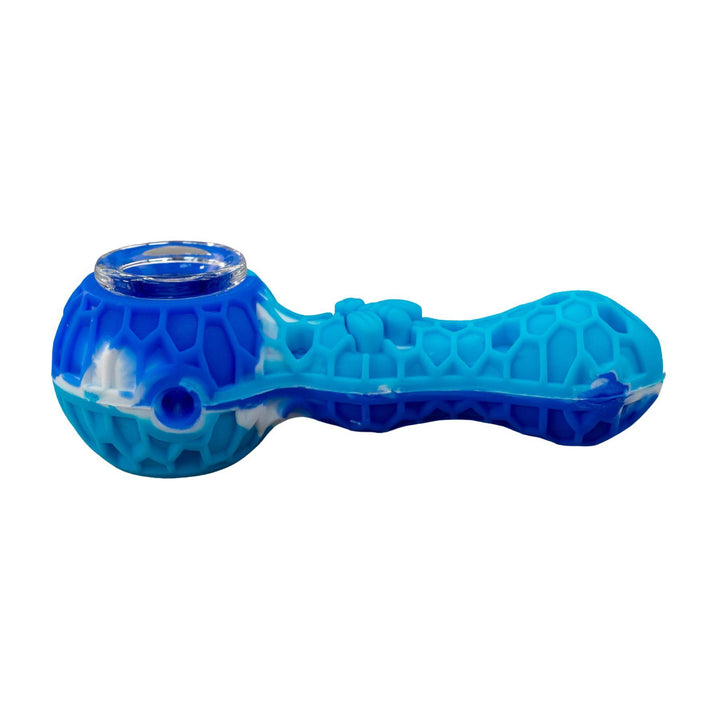 "Blue honeycomb-textured smoking pipe on a white background," - Up N Smoke.