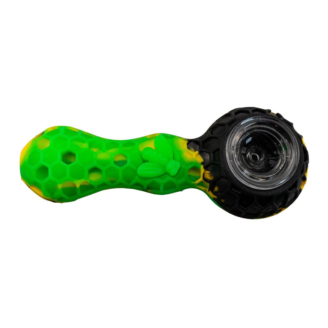 "A green, yellow, and black silicone hand pipe embossed with a honeycomb-pattern and a bee on the bodice," - Up N Smoke.