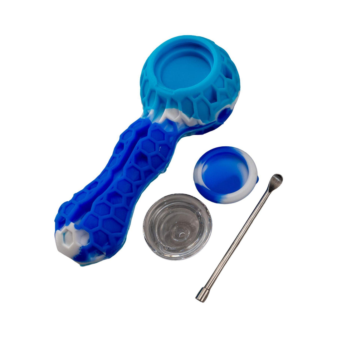 "Blue silicone smoking device with accessories on a white background," - Up N Smoke.