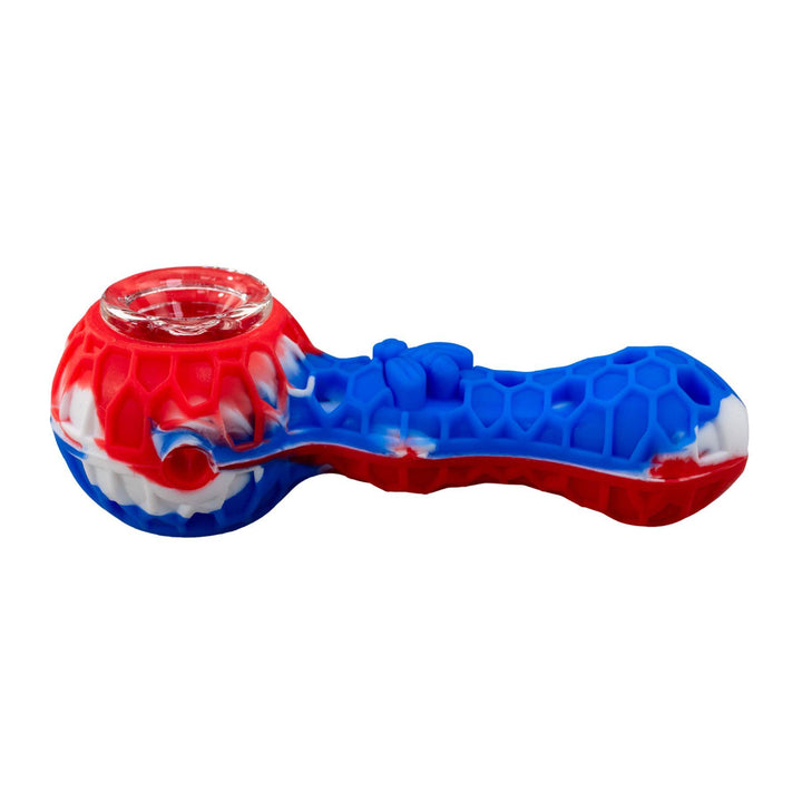 "Left-side of a red and blue Silicone Bee Spoon," - Up N Smoke. 