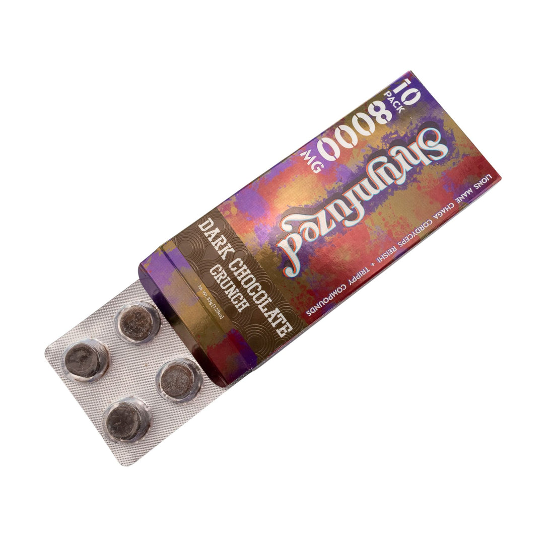 "Slightly open box of Shrumfuzed Mushroom Dark Chocolate Crunch 10pk on a white background," - Up N Smoke.