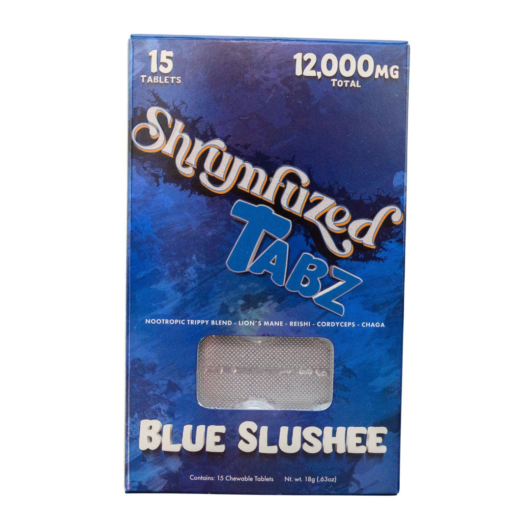 "Top-down view of a blue Shrumfuzed Mushroom Tablet 15pk in the flavor variation Blue Slushee on a white background," - Up N Smoke.