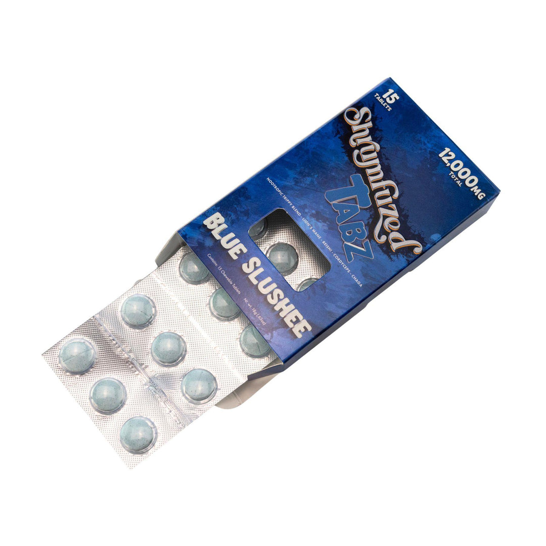 "Open package of a Blue Slushee Shrumfuzed Mushroom Tablet 15pk on a white background," - Up N Smoke.