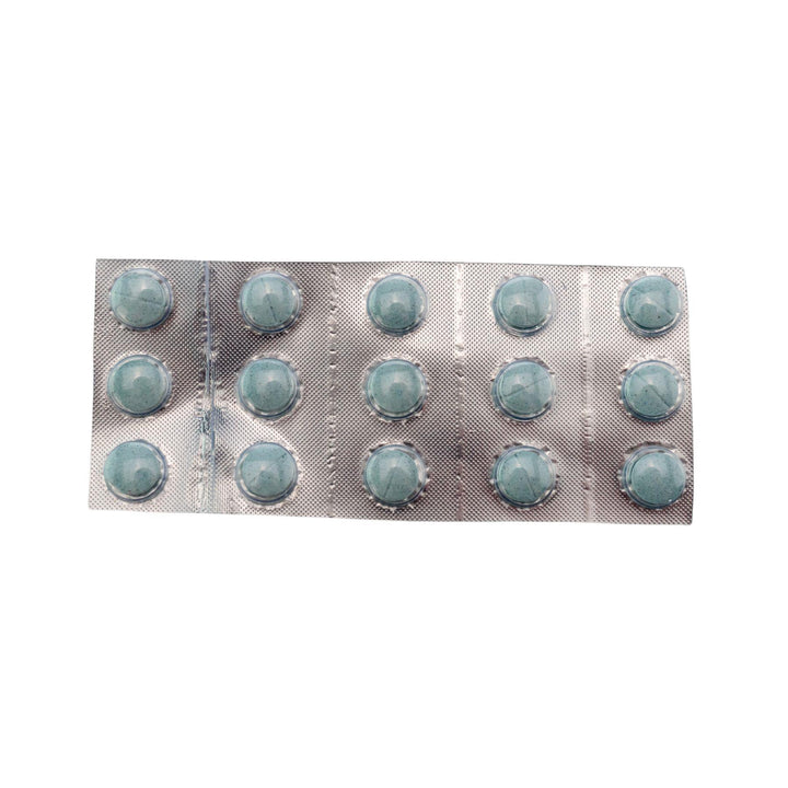 "Top-down view of a 15 pills in a blister pack of blue Shrumfuzed Mushroom Tablets in the flavor variation Blue Slushee on a white background," - Up N Smoke.