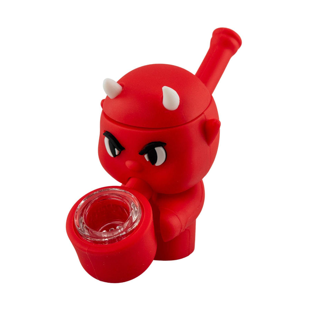 "Silicone Devil Hand Pipe that stands at three inches tall and features a storage compartment on top of the head," - Up N Smoke.