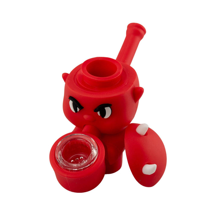"Angled view of a Silicone Devil Hand Pipe with the lid to the storage department removed and leaning against the body," - Up N Smoke.