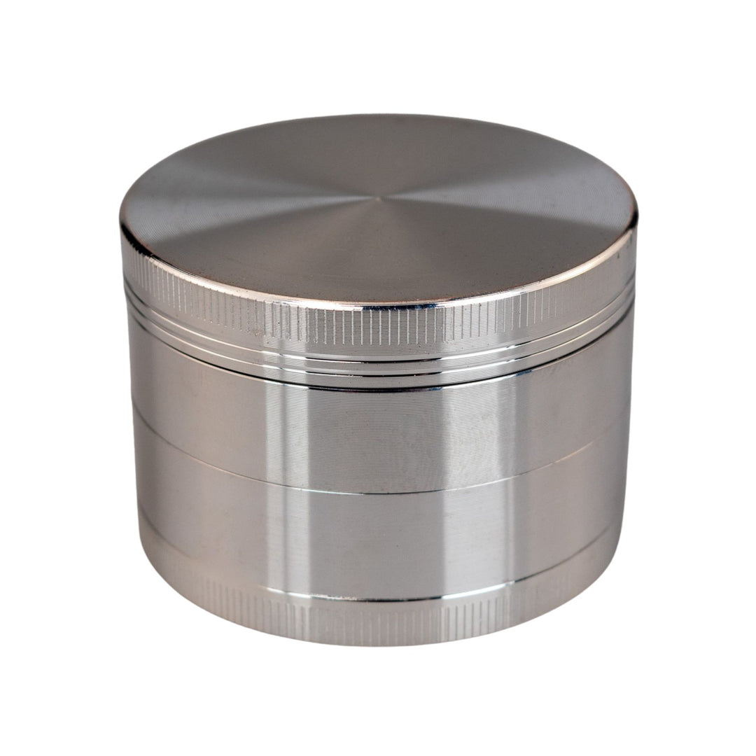 "Silver Classic 4-Piece Grinder on a white background," - Up N Smoke.