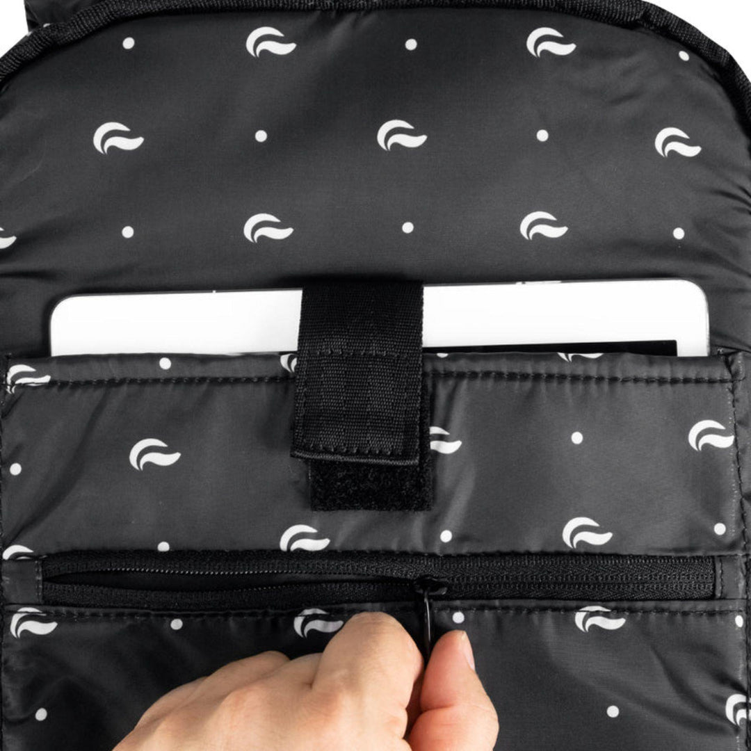 "Close-up of the interior pockets of a black SK9 Urban Backpack," - Up N Smoke.