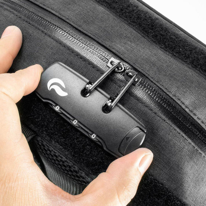 "Close-up of the zipper lock on a black Sk9 Urban Backpack," - Up N Smoke.