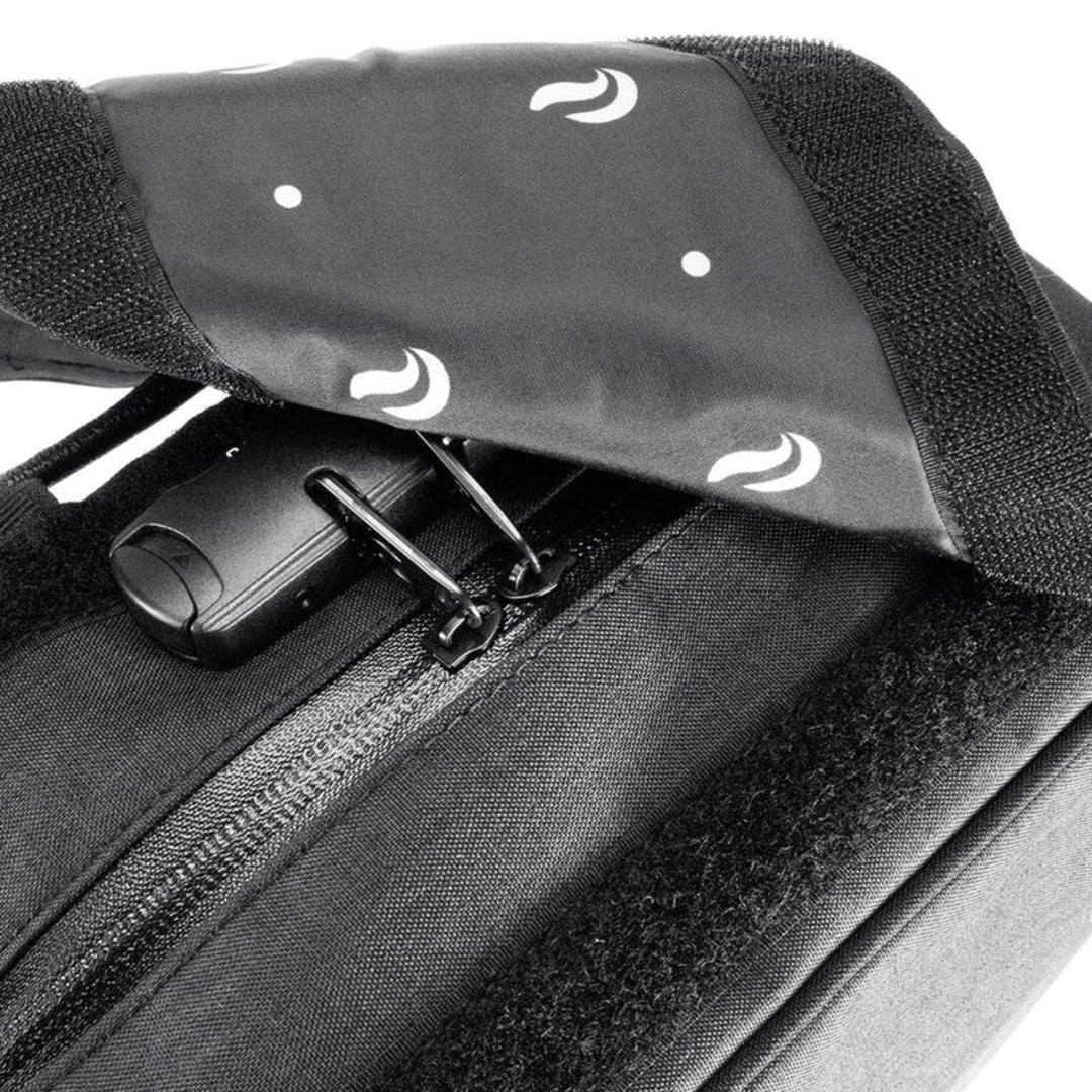 "Close-up of the top lock on a black Sk9 Urban Backpack," - Up N Smoke.