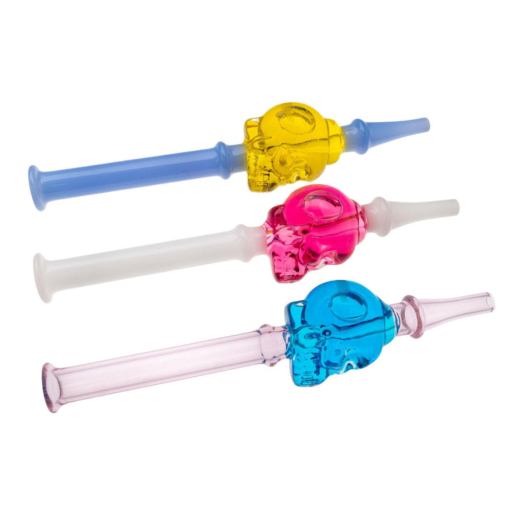 "Three slightly angled Skull Glycerin Nectar Collectors on a white background," - Up N Smoke.