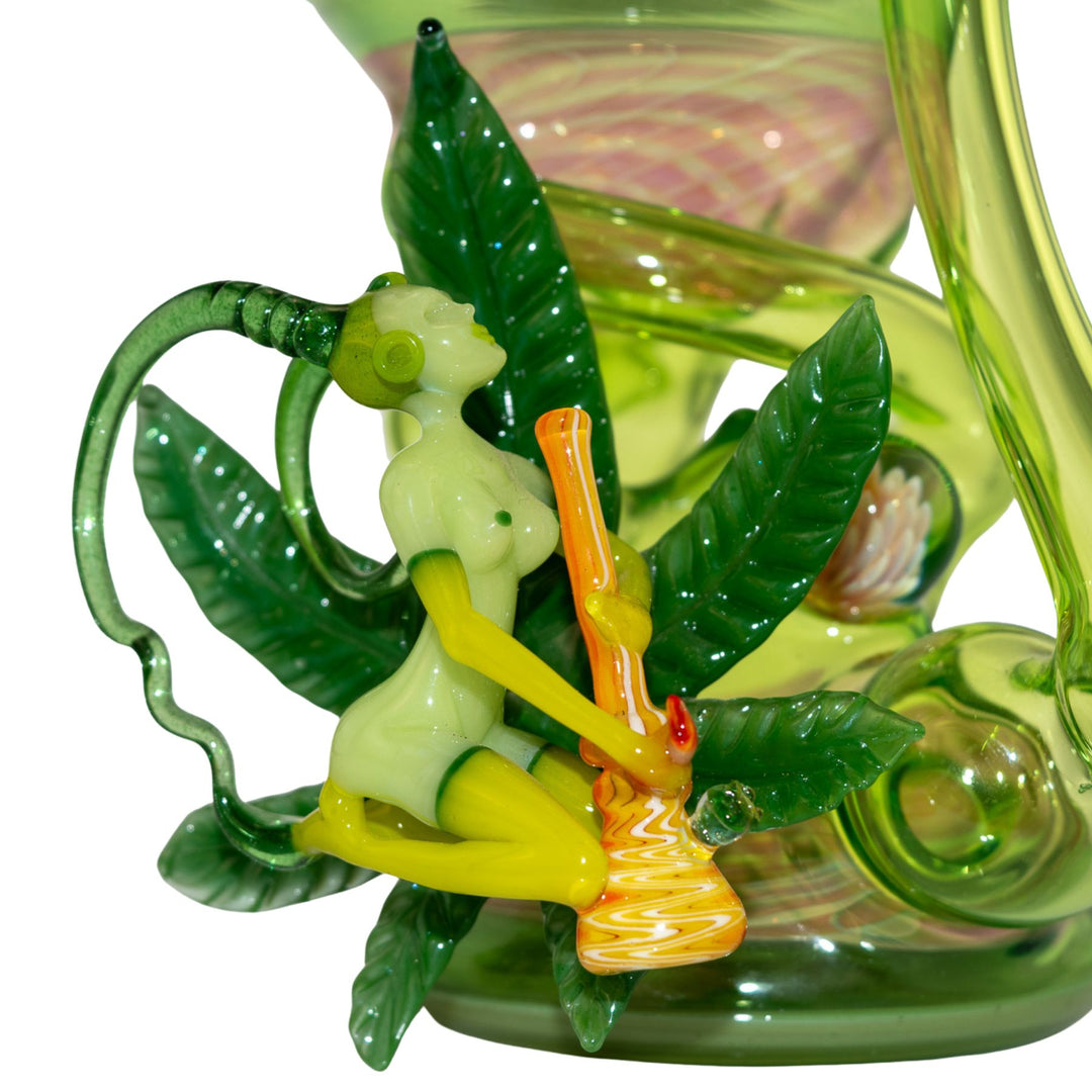 "Right side of a weed fairy that is fused to a Sol Fire Glass Recycler on a white background," - Up N Smoke.
