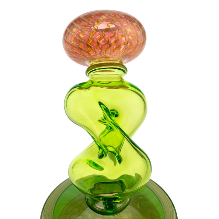 "Mouthpiece of a Sol Fire Glass Weed Fairy Recycler on a white background," - Up N Smoke.