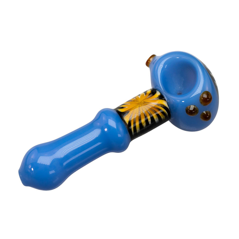 "Blue glass Step Into Now Pulsar Herb Spoon with a bright yellow sunburst design near the bowl," - Up N Smoke.