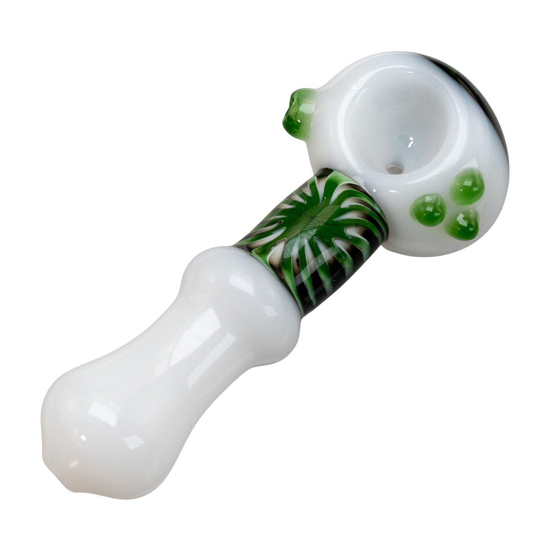 "White Pulsar Step Into Now Herb Spoon on a white background with a green and black sunburst design wrapped around the neck," - Up N Smoke.