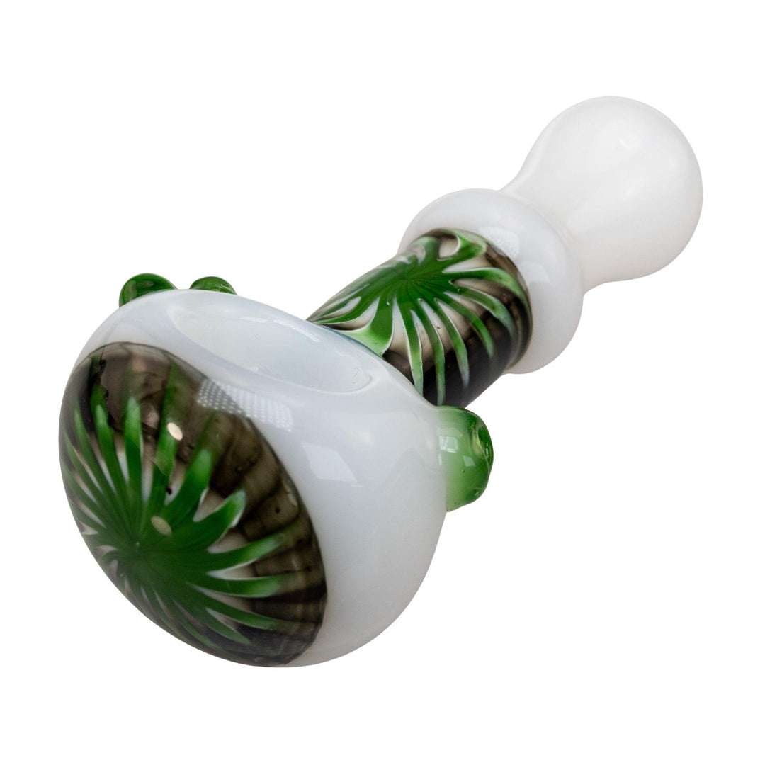 "Detailed look at the black and green sunburst design on a white Pulsar Step Into Now hand pipe," - Up N Smoke.