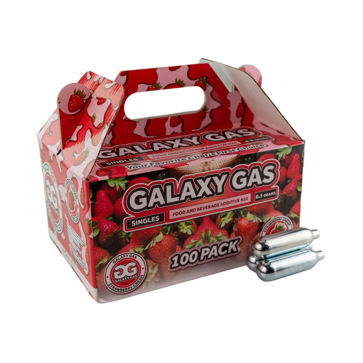"Side angle of a 100ct box of Strawberry Cream Galaxy Gas with three cartridges in front on a white background," - Up N Smoke.