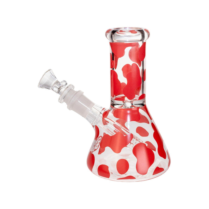 "A compact 6.5-inch glass water pipe featuring a playful pink cow print design. The pipe has a straight tube shape with pink accents, and a wide base for stability, perfect for small setups or travel." - Up N Smoke.