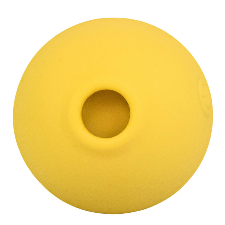 Suction Lemon Toy bottom side displayed on a white background - UNS