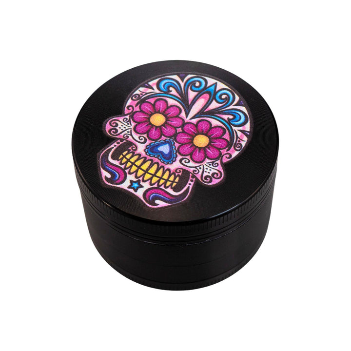 "Sugar Skull 4-Piece Grinder on a white background," - Up N Smoke.
