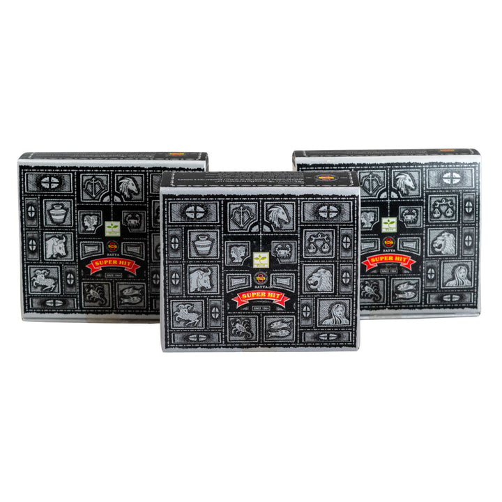 Three black boxes of Satya Super Hit Dhoop Cones on a white background