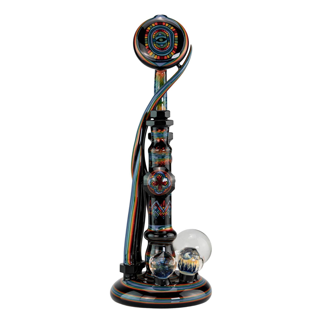 "Functional art piece created by Brian Jacobson and Chaiah Sullivan of Unparalleled Glass on a white background," - Up N Smoke.