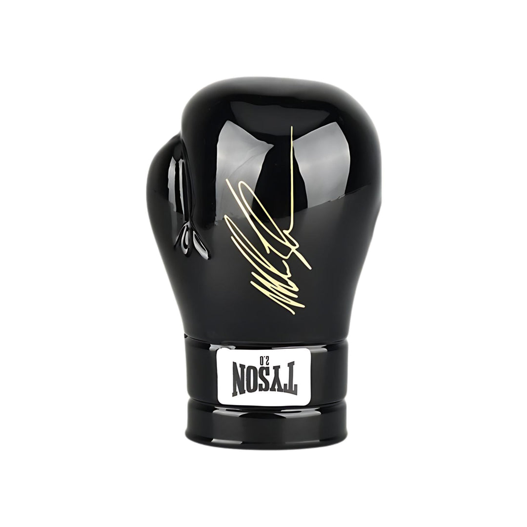 "A black Mike Tyson Boxing Glove hand pipe, photographed from the exterior, featuring Mike Tyson's gold signature on the outside." - Up N Smoke.