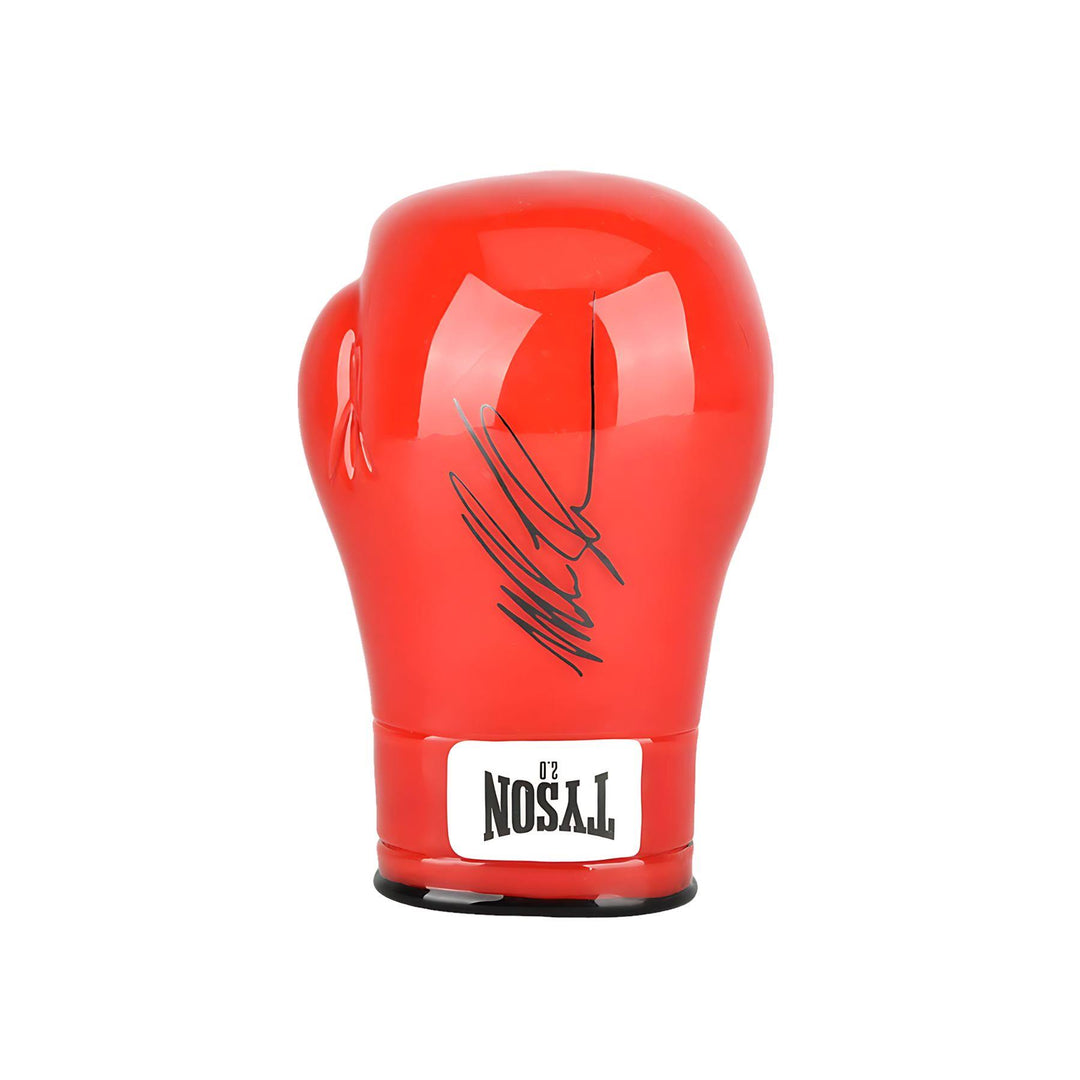 "A red Mike Tyson Boxing Glove hand pipe, photographed from the exterior, featuring Mike Tyson's signature in black on the outside." - Up N Smoke.