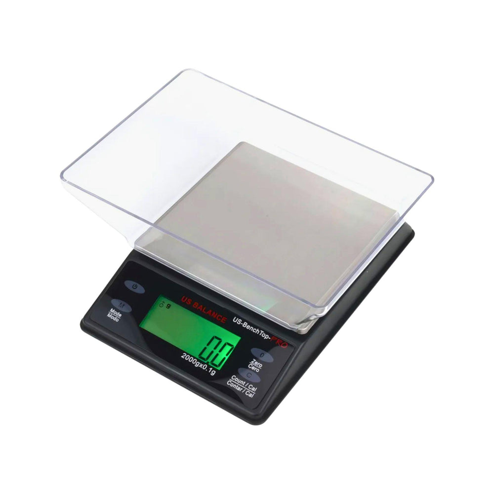 "The US-BENCHTOP-PRO Digital Scale with its stainless steel platform, backlit LCD display, and removable lid doubling as a weighing tray." - Up N Smoke.