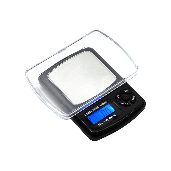 "A US-MAGNUM-1000XR Digital Pocket Scale with its lid flipped upside down and used as a tray on top of the stainless steel platform." - Up N Smoke.