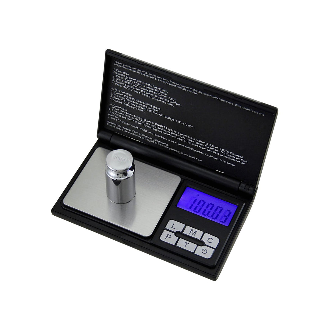 "A US-NIGHTOWL 250g x 0.01 Digital Pocket Scale with a calibration weight on the weighing platform." - Up N Smoke.