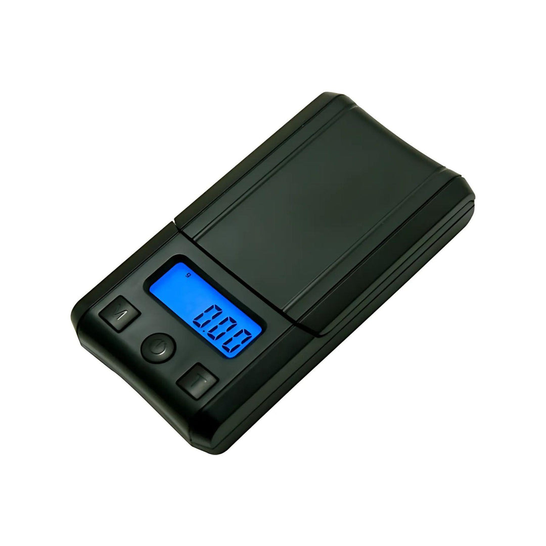 "The US-NUEVO PLUS Pocket Scale, black, displayed with its backlit LCD screen and stainless steel platform." - Up N Smoke.