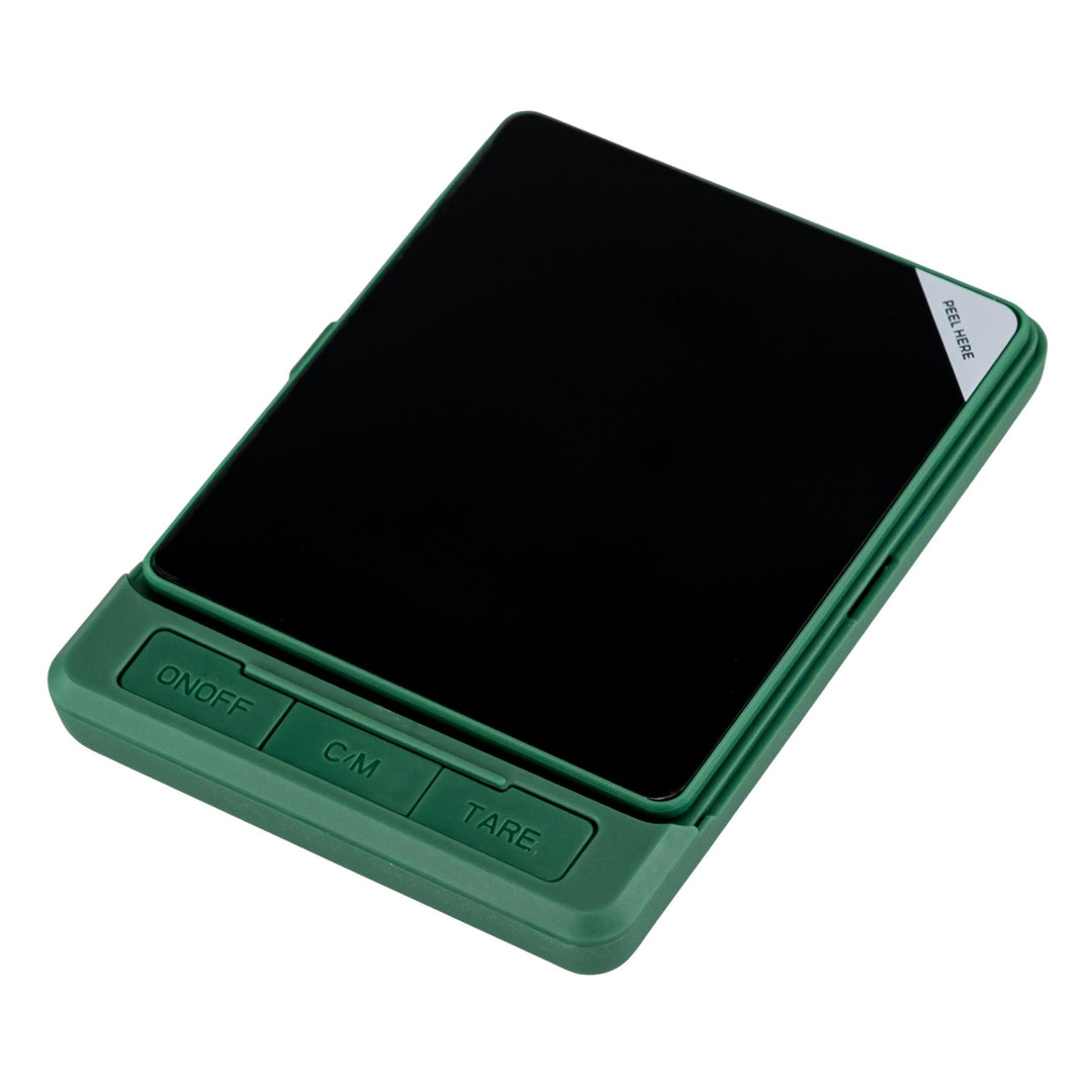 "Green digital scale with a black display on a white background," - Up N Smoke.