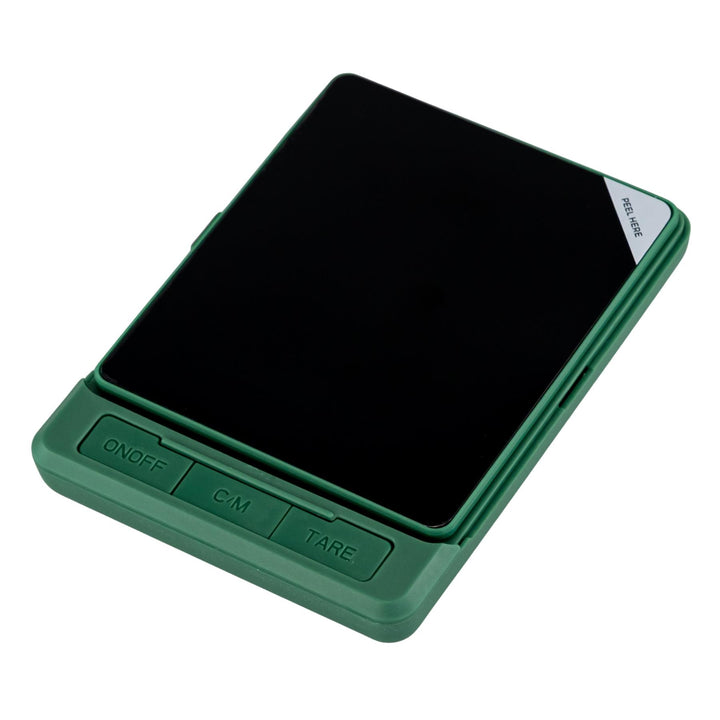 "Green digital scale with a black display on a white background," - Up N Smoke.