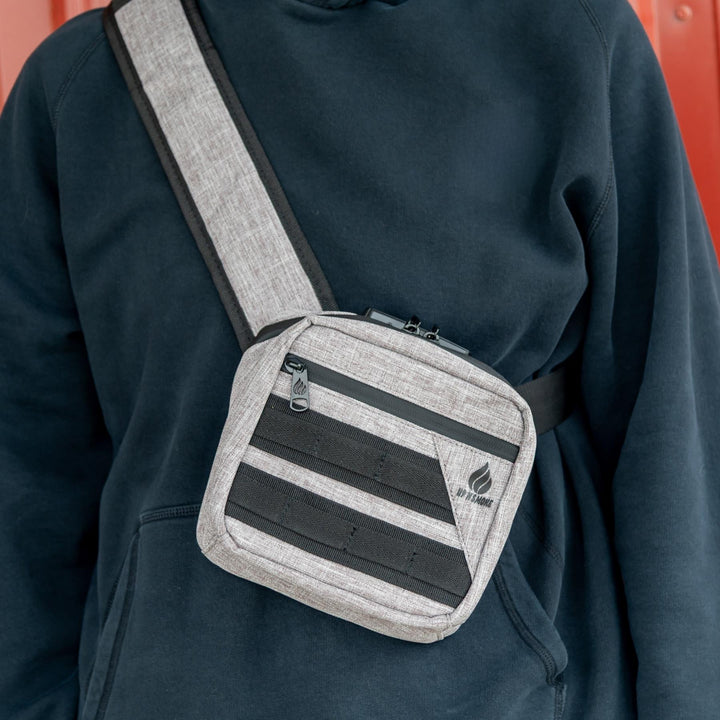 Up N Smoke Smell-Proof Locking Crossbody Bag grey styled photo with bag being worn - Up N Smoke