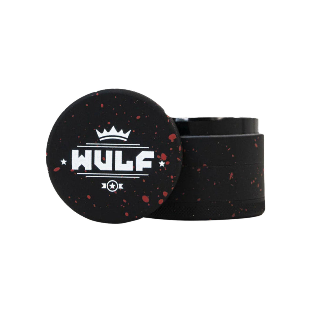 "WULF 4-Piece Grinder that is 50mm and features a red splatter design," - Up N Smoke.