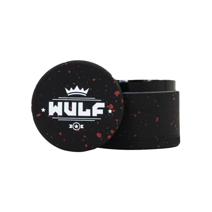 "WULF 4-Piece Grinder that is 50mm and features a red splatter design," - Up N Smoke.