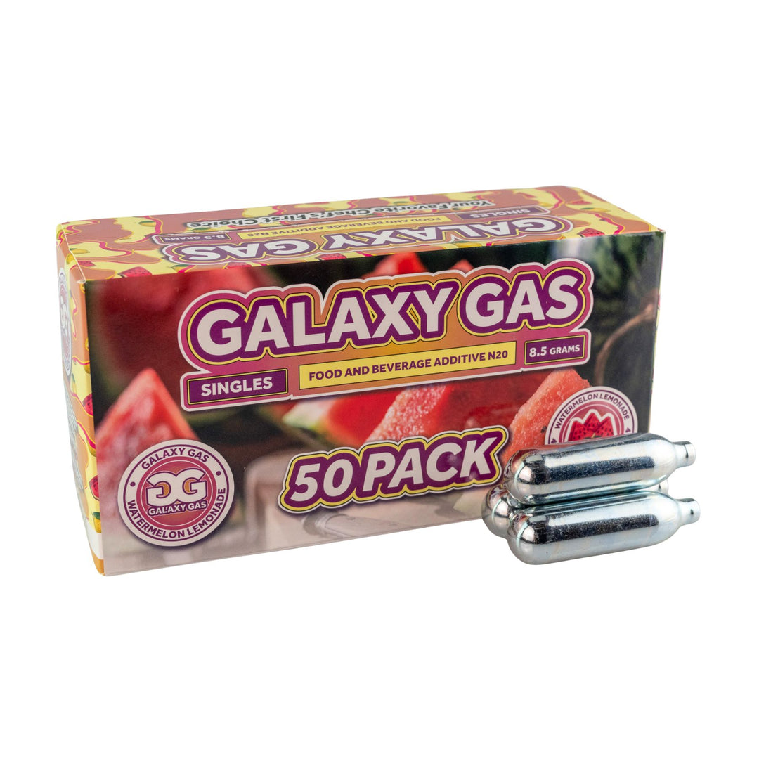 "Side angle of a 50ct box of Watermelon Lemonade Galaxy Gas with three cartridges in front on a white background," - Up N Smoke.