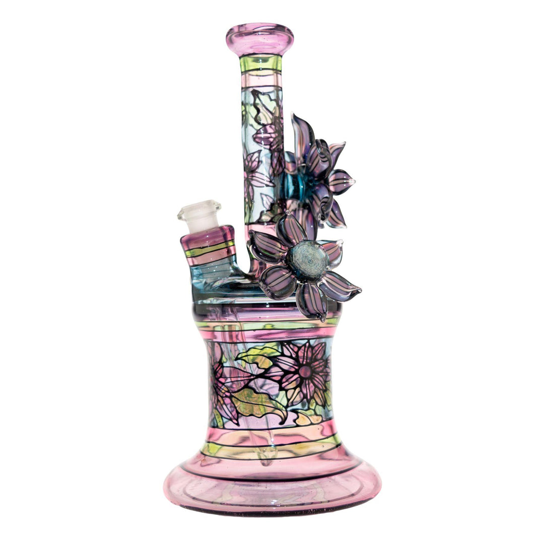 "Left side of a Windstar x Mars Heady Collab that features a rotating opal flower on the backside and stands at 8.25 inches tall on a white background," - Up N Smoke.