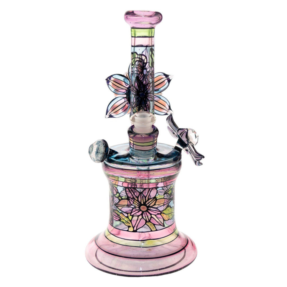 "Front of a Windstar x Mars Heady Collab that features two dichroic beads and has a base diameter of 3.75 inches on a white background," - Up N Smoke.