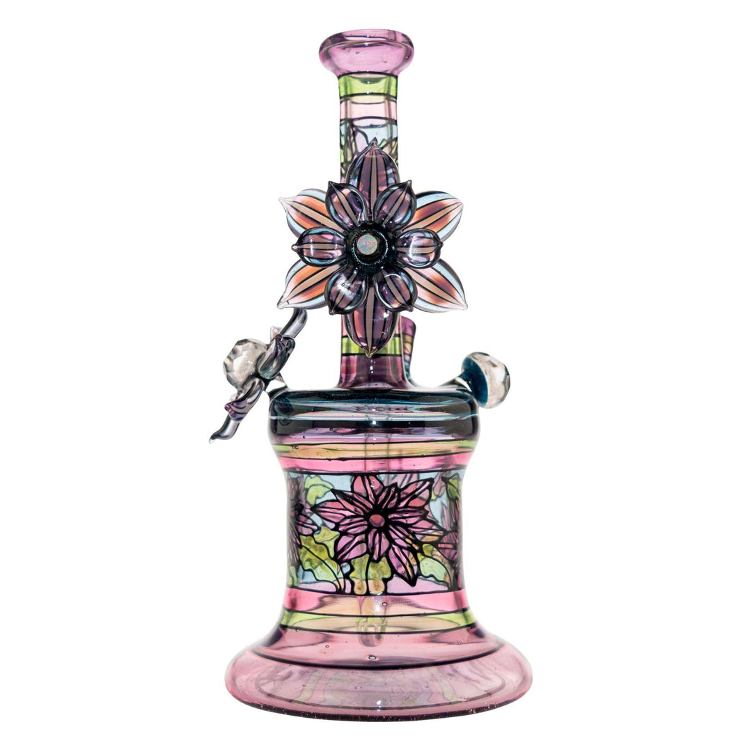 "Backside of a Windstar x Mars Collab that has an opal rotating flower on a white background," - Up N Smoke.