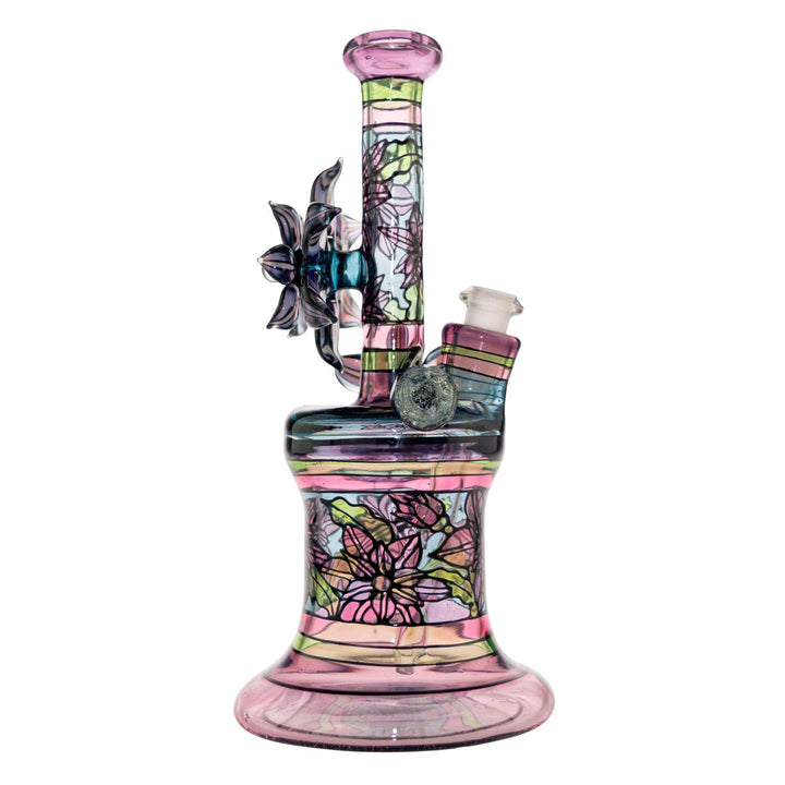 "Right side of a Windstar x Mars Heady Collab, showcasing one of the dichroic beads that shimmers with a wide depth of color on a white background," - Up N Smoke.