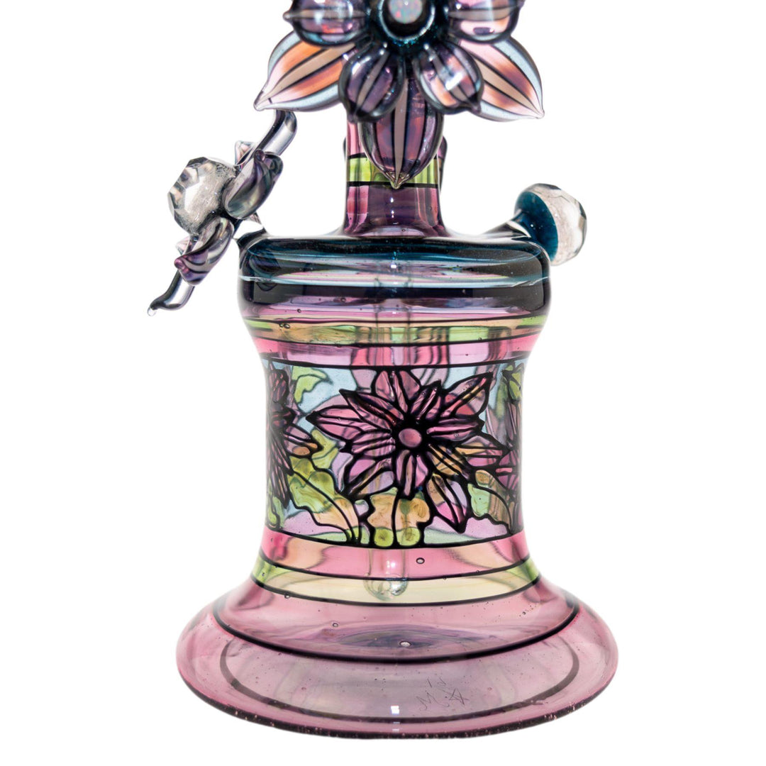 "Colorful stained-glass effect of the bodice of a Windstar x Mars Heady Collab, that features flowers and pastels on a white background," - Up N Smoke.