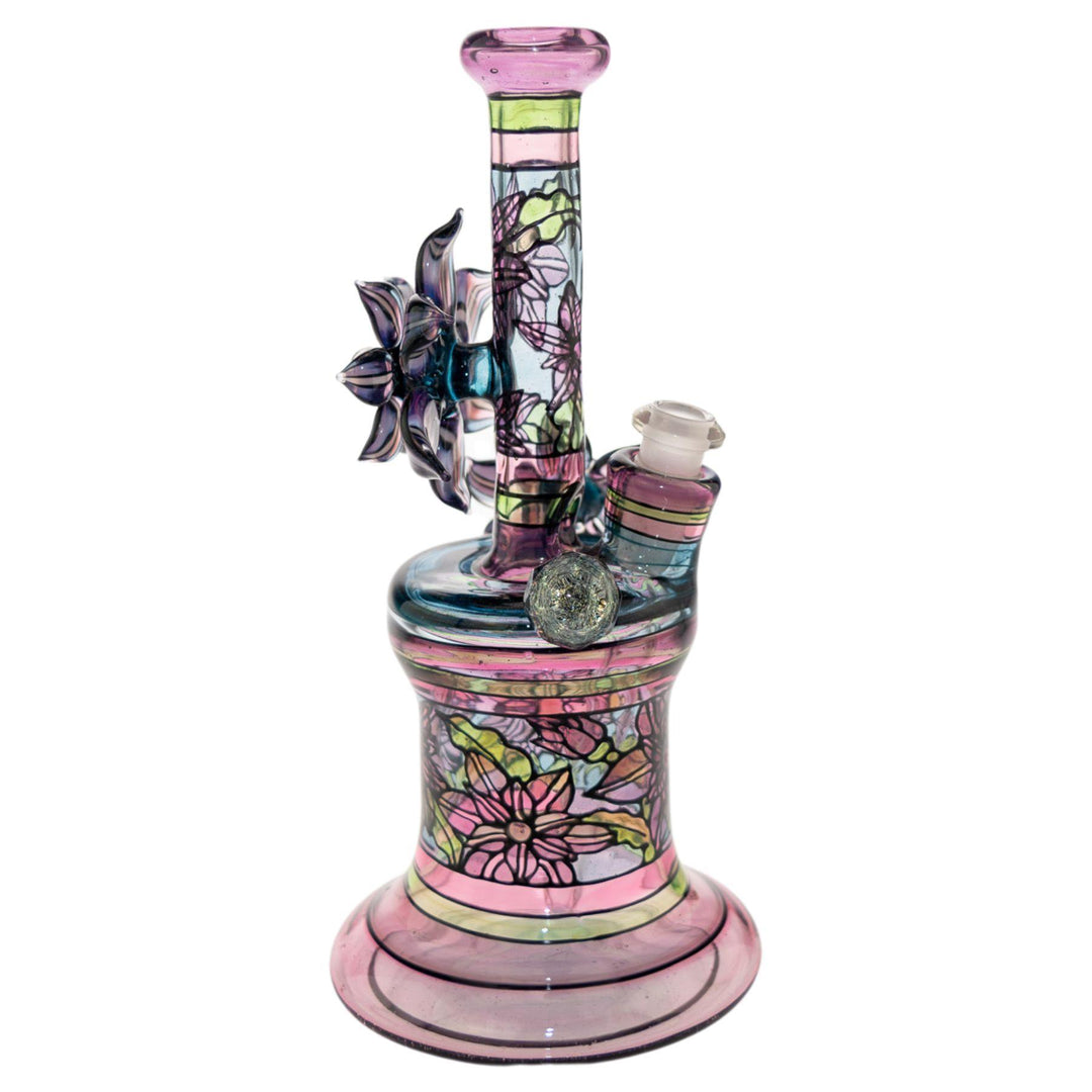 "Right side of a Windstar x Mars Heady Collab that features a rotating opal flower on the back of the piece on a white background," - Up N Smoke.