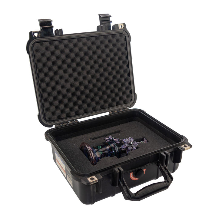 "Open black hard-shell case with a Windstar x Mars Heady Collab within on a white background," - Up N Smoke.