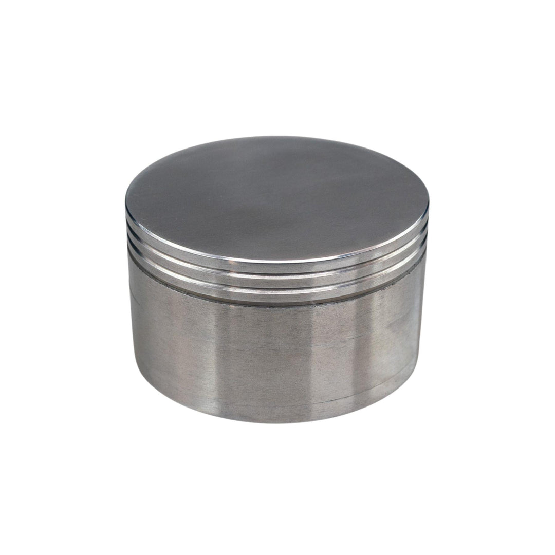 "A 2.5'' aluminum herb grinder in silver," - Up N Smoke.