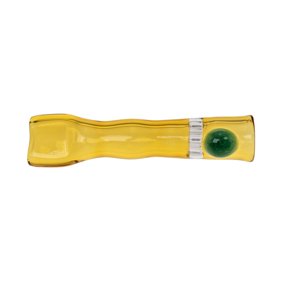 "Amber Blazing Glass Chillum with a blue stabilizing bead near the mouthpiece on a white background," - Up N Smoke.