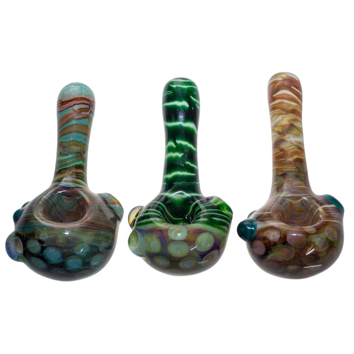 Frontal group photo of three Fool Blown Marbled Honeycomb spoons. Each design is handcrafted and features unique designs. - Up N Smoke.